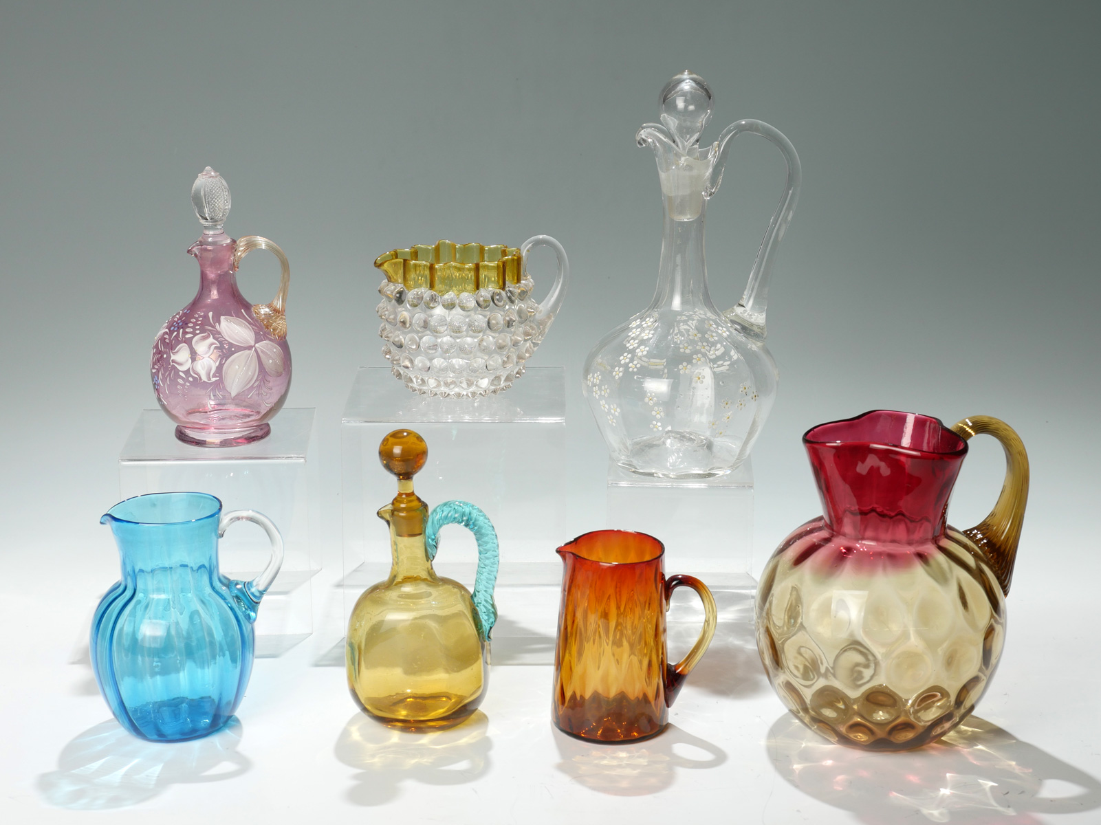 Appraisal: PIECE ART GLASS PITCHERS AND DECANTERS Comprising - Amberina diamond