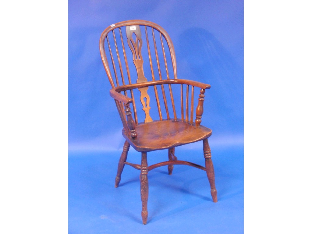 Appraisal: A thC elm and ash Windsor chair the high back