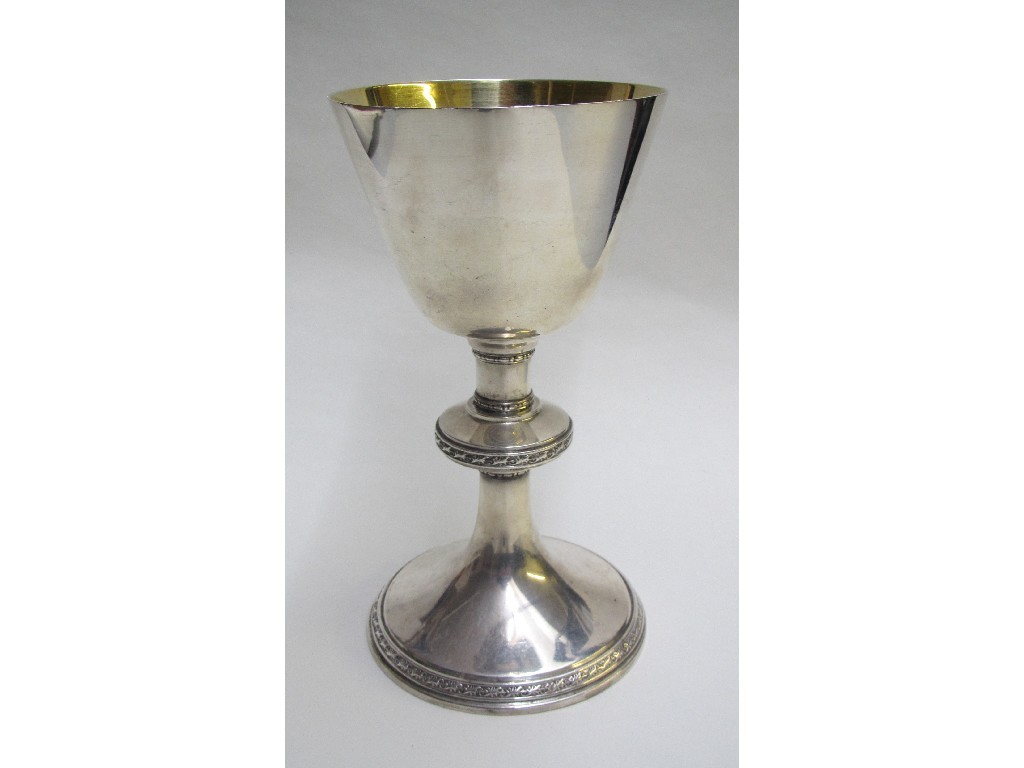 Appraisal: A silver communion chalice the tapering bowl on a knopped