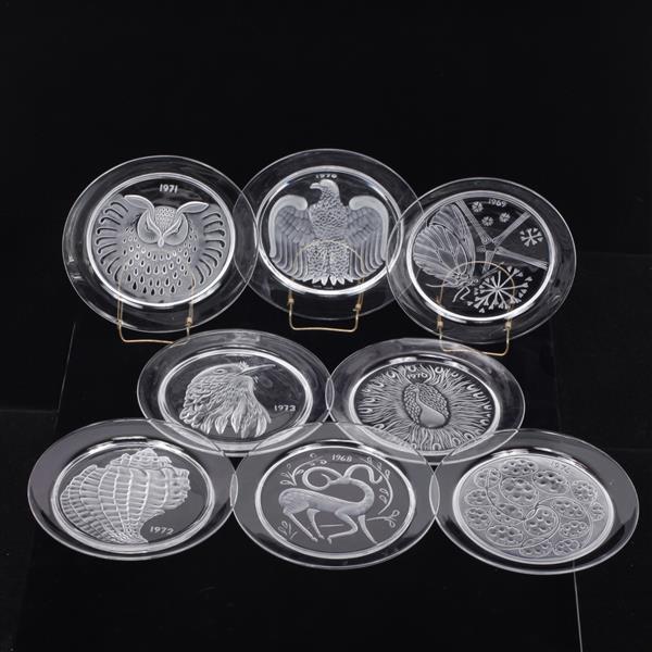 Appraisal: Eight Lalique annual commemorative glass plates Designs include gazelle peacock