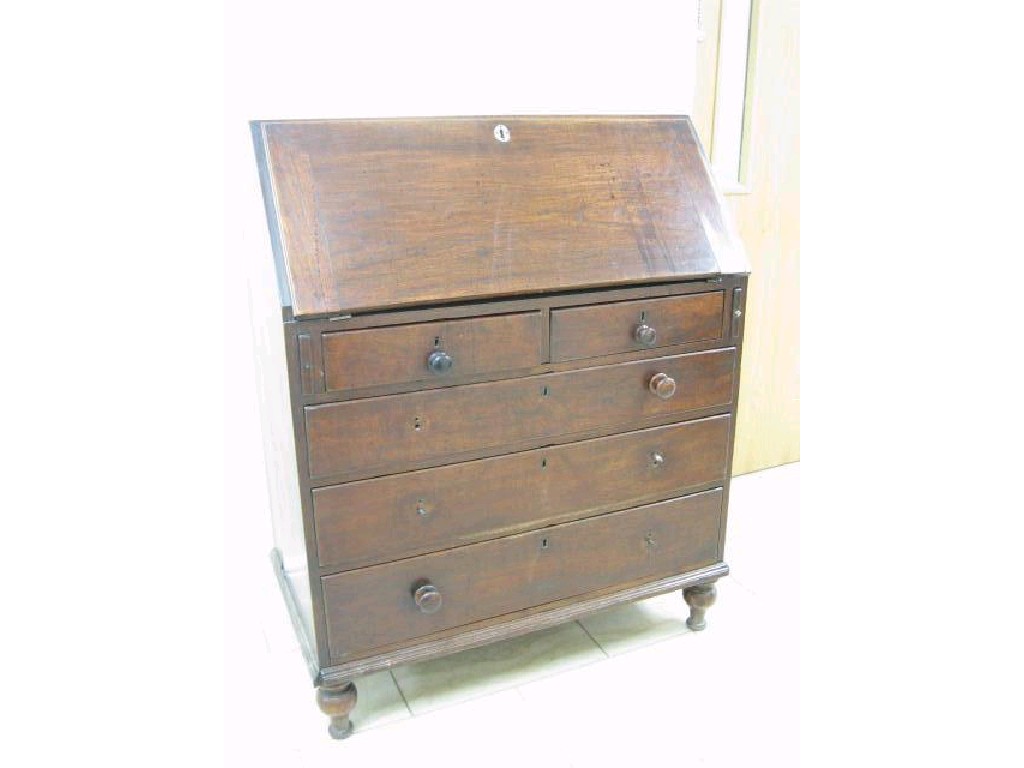 Appraisal: An antique walnut Bureau with fitted interior above two short