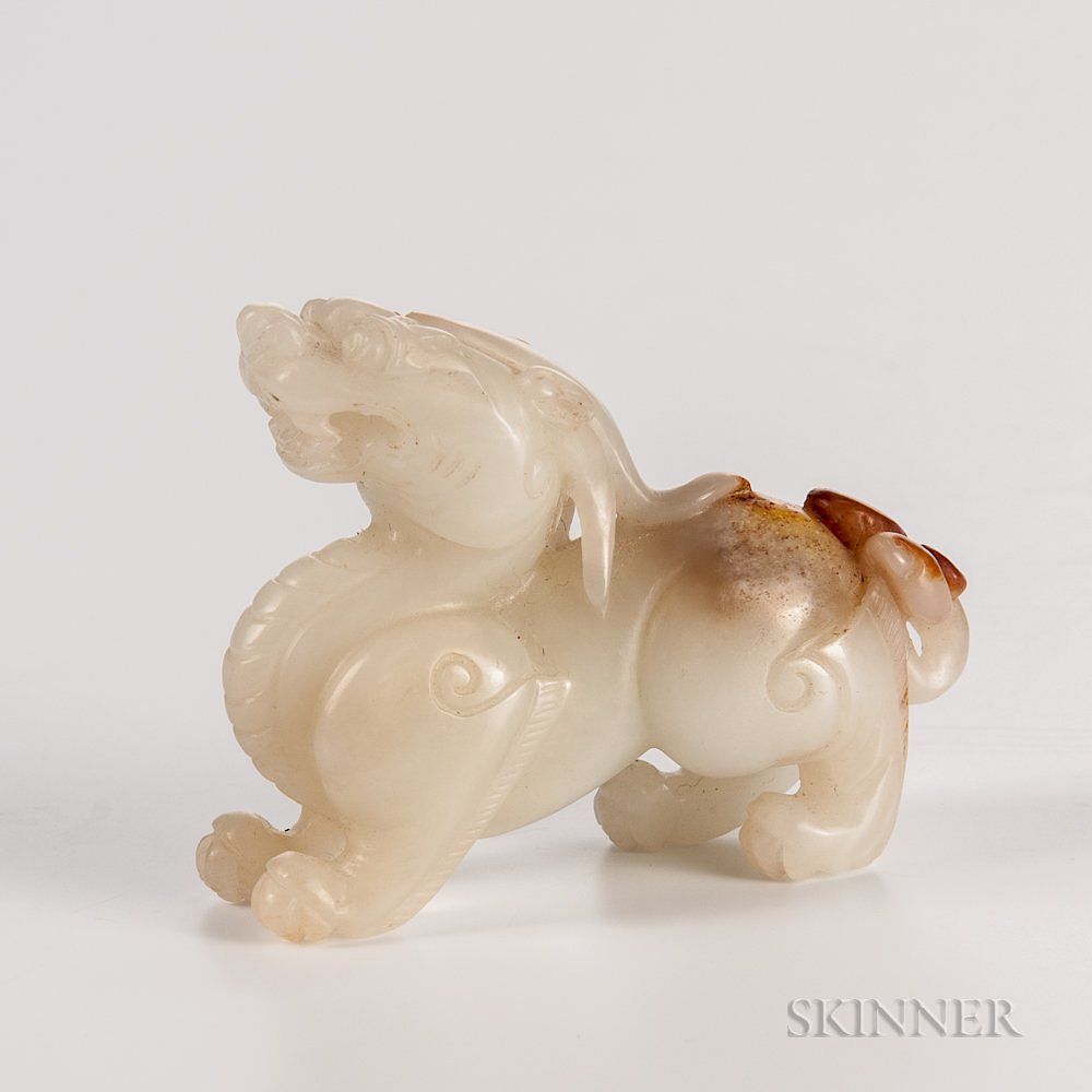 Appraisal: Carved Jade Qilin Carved Jade Qilin China standing on all