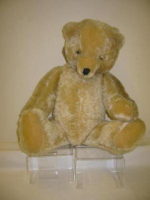 Appraisal: An English teddy bear mid th century covered in pale