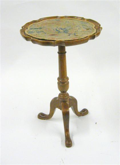 Appraisal: George II style walnut candlestand The piecrust top decorated with