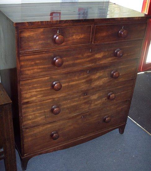 Appraisal: An early Victorian mahogany chest of four long and two