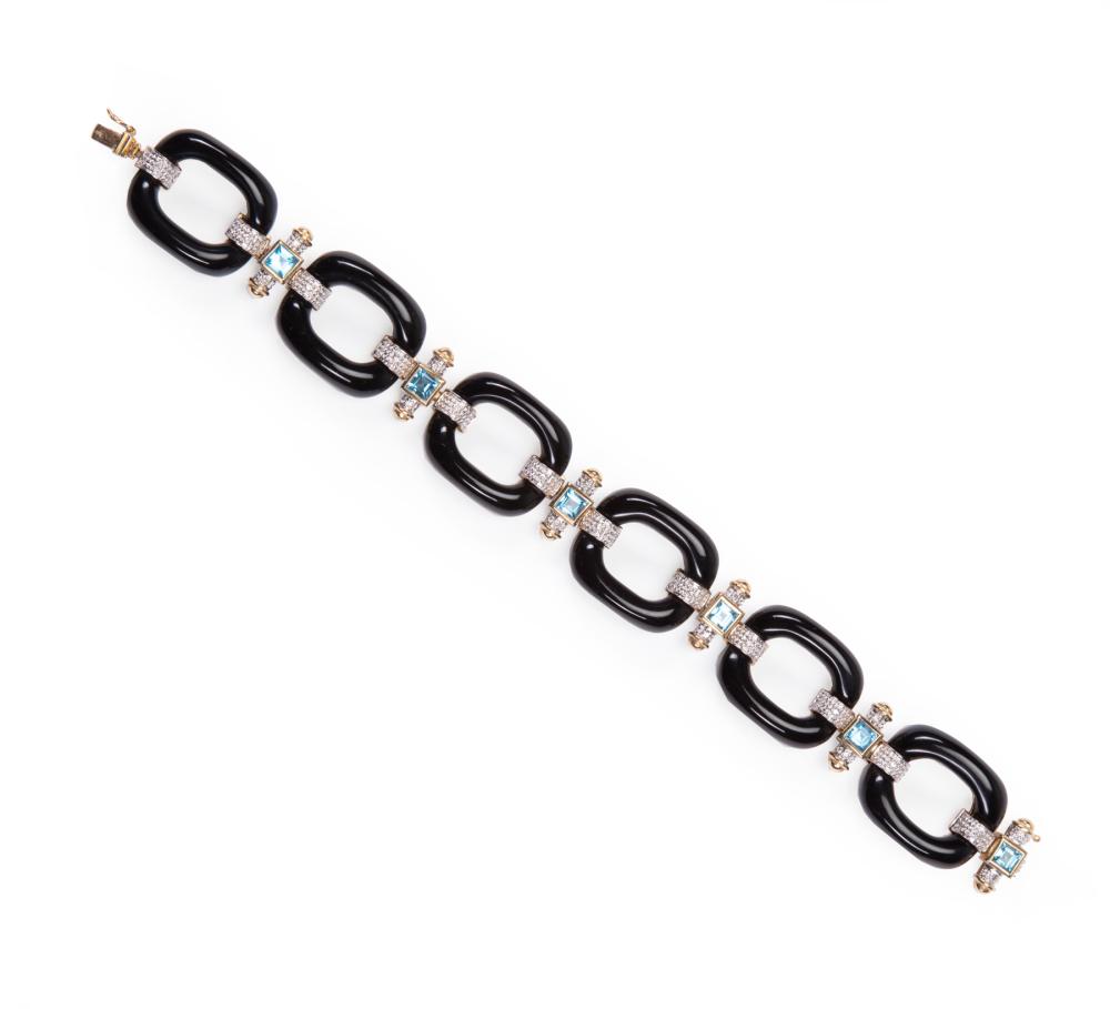 Appraisal: kt Yellow Gold Onyx Blue Topaz and Diamond Link Bracelet