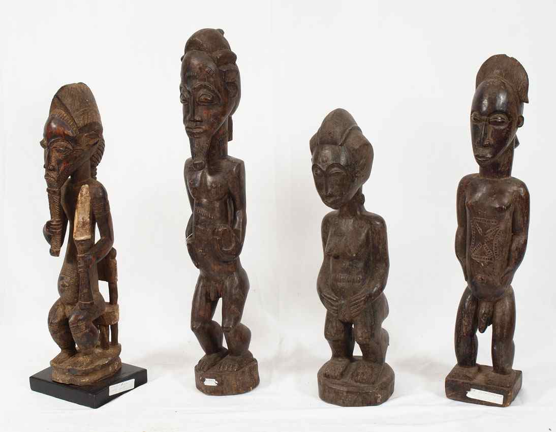 Appraisal: CARVED AFRICAN BAULE FIGURES '' x '' x '' lbs