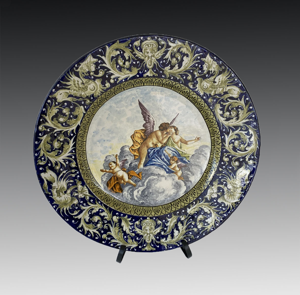 Appraisal: TH CENTURY ITALIAN MAJOCILA CHARGER Having a cherub angelic scene