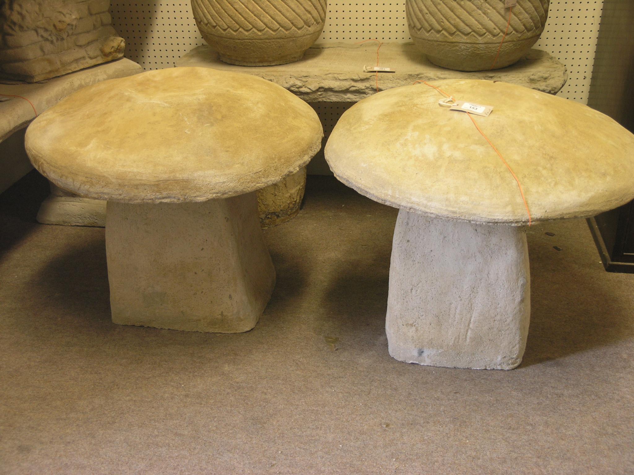 Appraisal: A pair of moulded concrete staddle stones