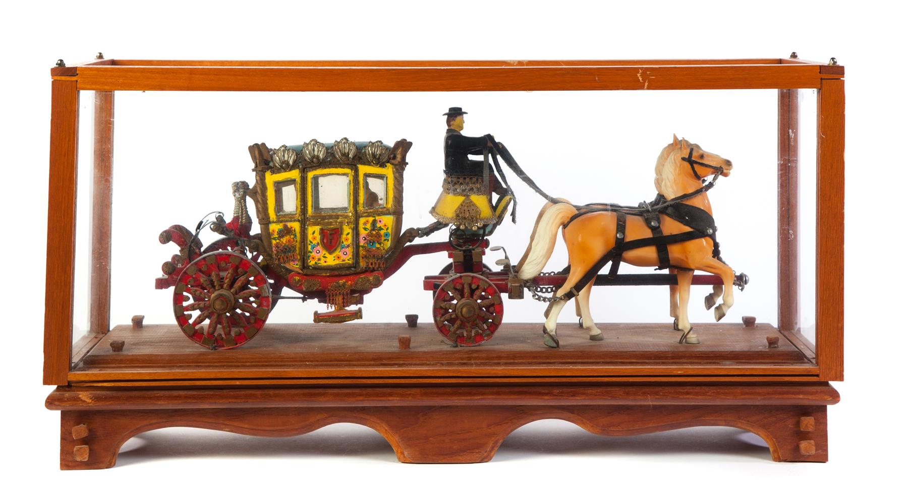 Appraisal: CASED MODEL OF A ROYAL CARRIAGE Twentieth century Elaborately carved