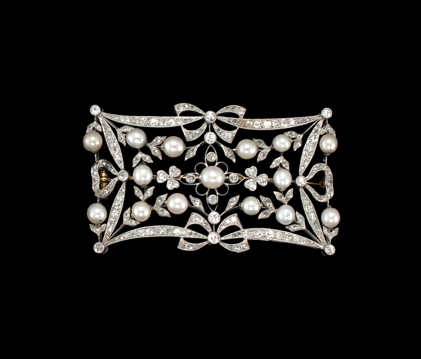 Appraisal: PLATINUM DIAMOND AND PEARL BROOCH In an rectangular openwork design