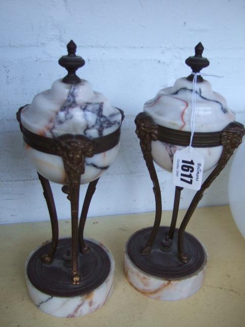 Appraisal: A pair of Sienna marble garnitures of lidded urn form