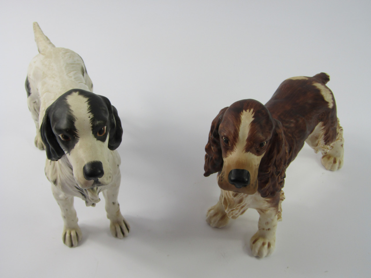 Appraisal: A Goebel figure of a springer spaniel and another of