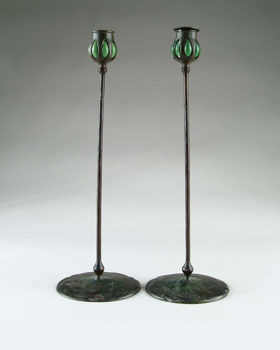 Appraisal: PAIR OF TIFFANY STUDIOS CANDLESTICKS Tall bronze candlesticks with green