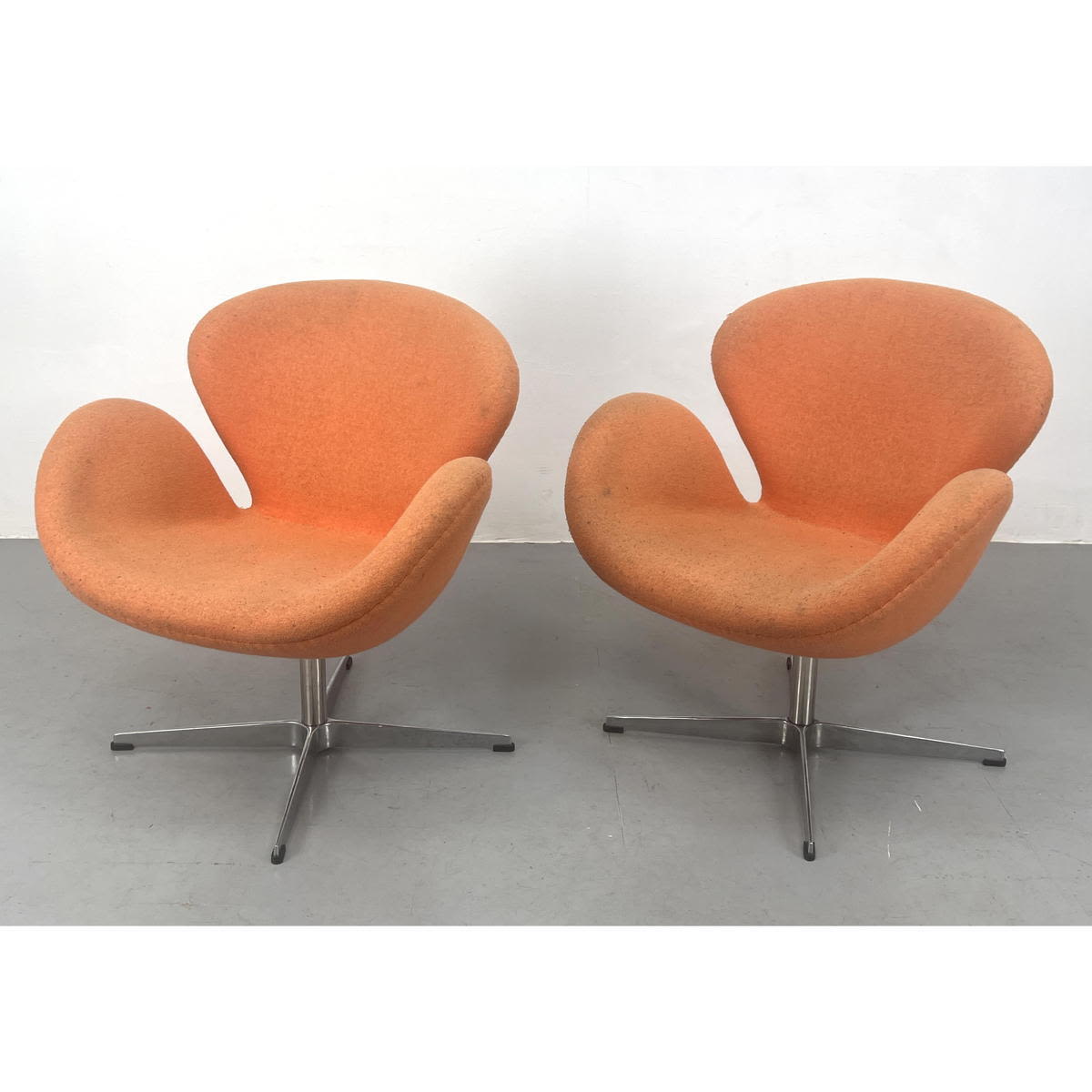 Appraisal: Pr Arne Jacobsen style swan chairs Orange Fabric Not vintage