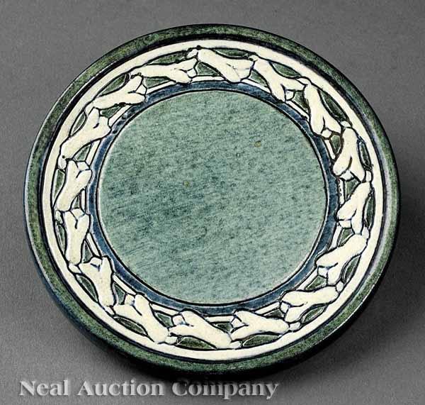 Appraisal: A Newcomb College Art Pottery High Glaze Trivet decorated by