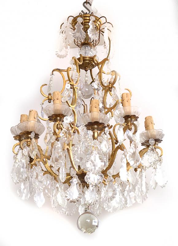 Appraisal: A FRENCH CRYSTAL AND BRASS CHANDELIER the openwork body hung