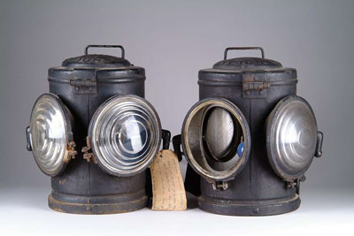 Appraisal: PAIR OF HANDLAN MARKER LAMPS Marked W LEER Electrified One