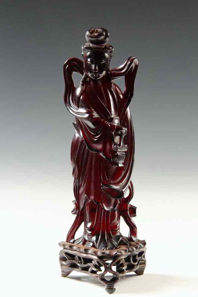 Appraisal: AMBER FIGURINE - Reconstituted Red Amber Figurine of a Standing