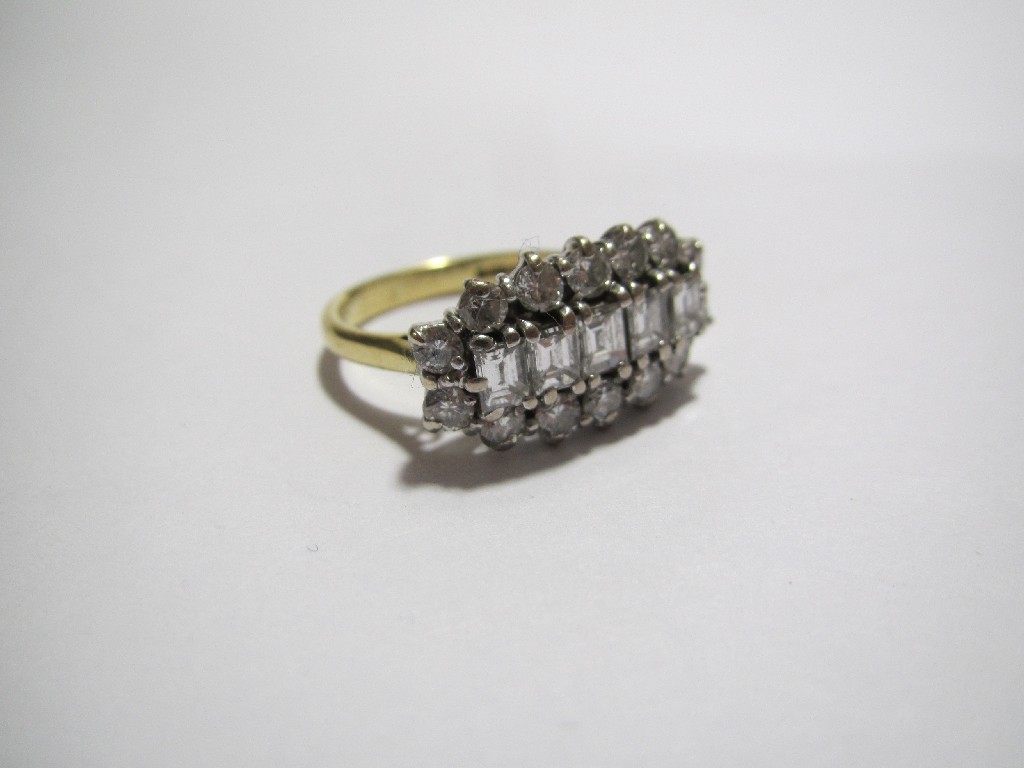 Appraisal: A contemporary diamond cluster ring centring on five rectangular step