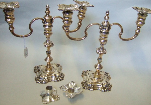 Appraisal: A pair of silver table candle sticks each of th