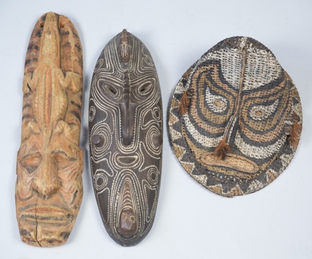 Appraisal: Three African Masks Balsa Wood Mask with Crocodile Carved Mask