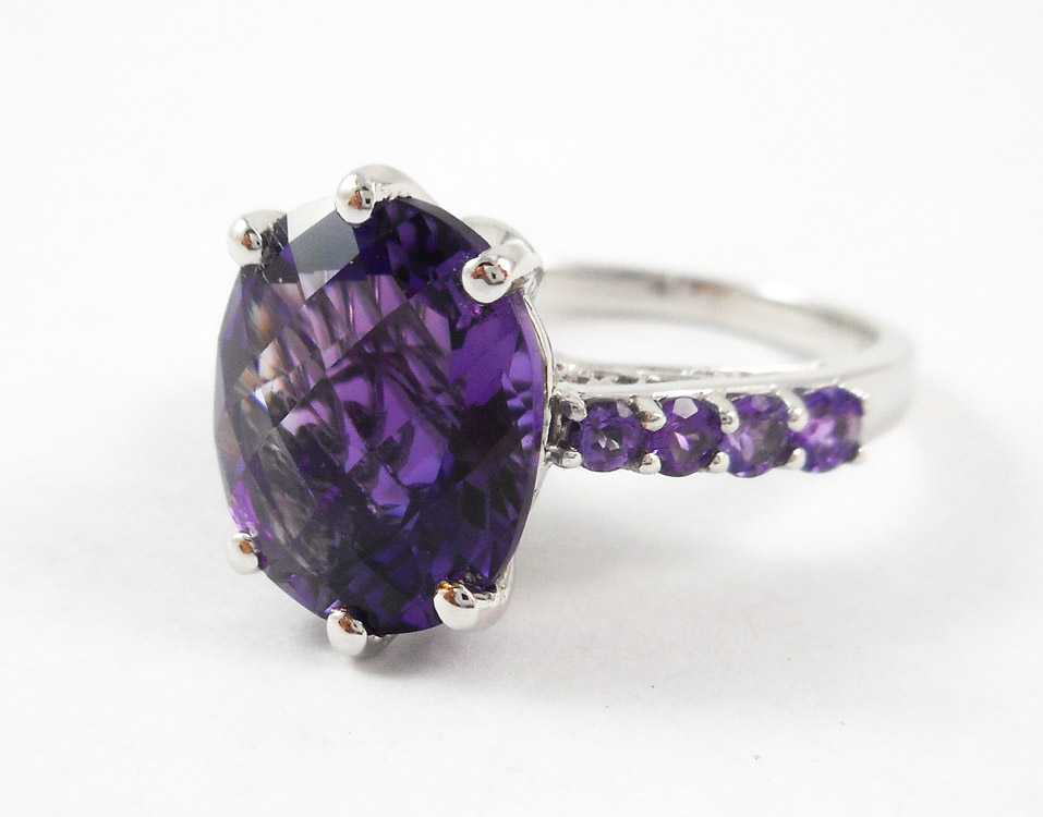 Appraisal: AMETHYST DIAMOND AND FOURTEEN KARAT GOLD RING The white gold