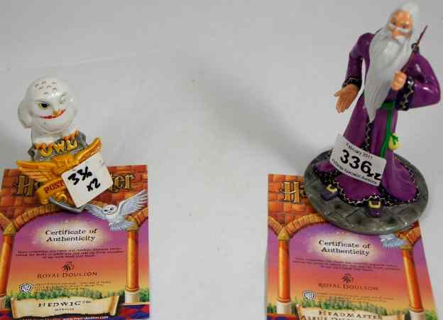 Appraisal: Royal Doulton Harry Potter Figures Hedwig and Headmaster Albusdumbledore both