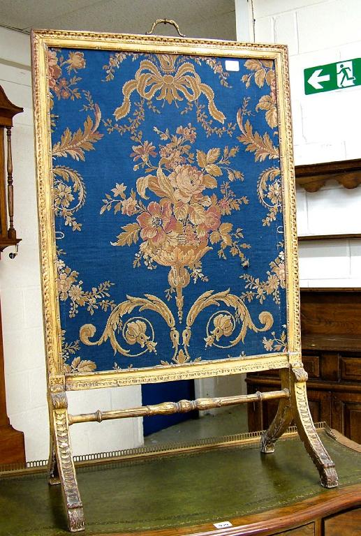 Appraisal: th century gilt and gesso fire screen with a blue