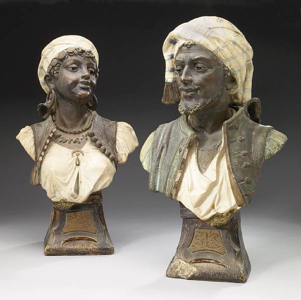 Appraisal: A pair of Austrian polychrome decorated terracotta busts of a