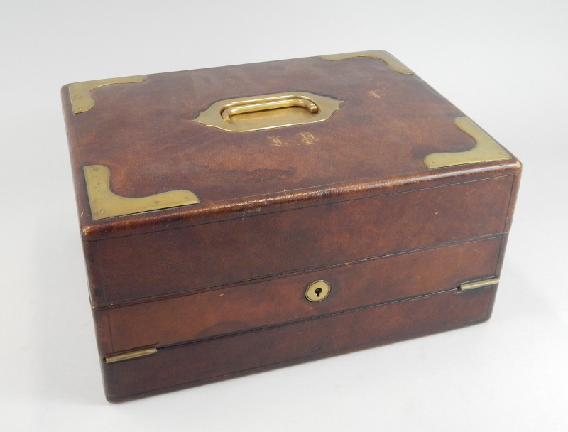 Appraisal: A late th early thC leather writing box the hinged