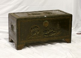 Appraisal: A th century carved Chinese camphorwood trunk cm wide cm