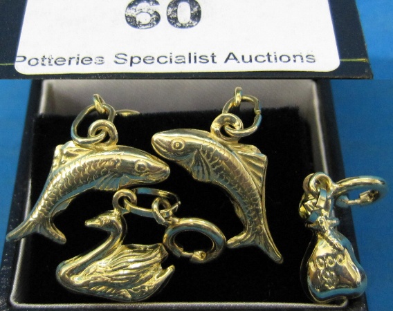 Appraisal: Four CT gold Charms Fish Bag and Swan retail price