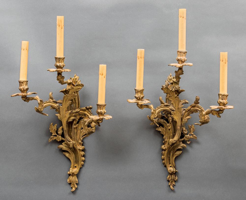 Appraisal: Pair of Louis XV-Style Gilt Bronze Three-Light Sconces foliate and