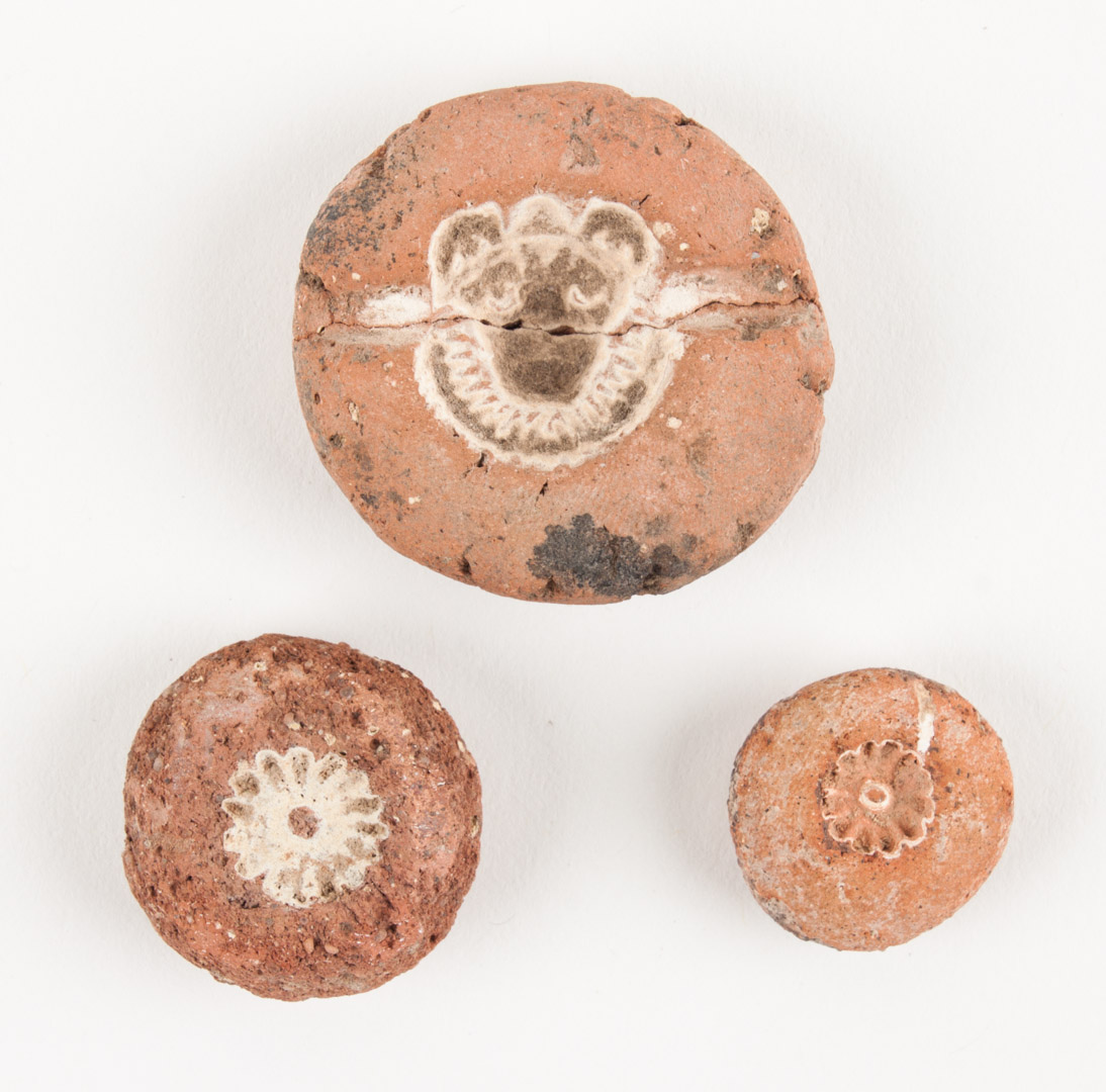 Appraisal: Three ancient Egyptian clay molds one modeled as a lion's