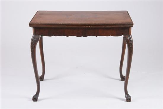 Appraisal: GEORGIAN STYLE OCCASIONAL TABLE th century walnut String inlaid top