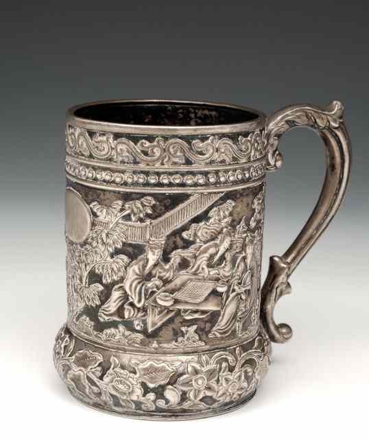 Appraisal: A SMALL CHINESE SILVER CHRISTENING MUG embossed with scribes and