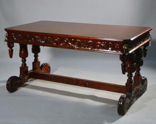 Appraisal: Mahogany Carved Library Table Mahogany carved library table Ornate carved