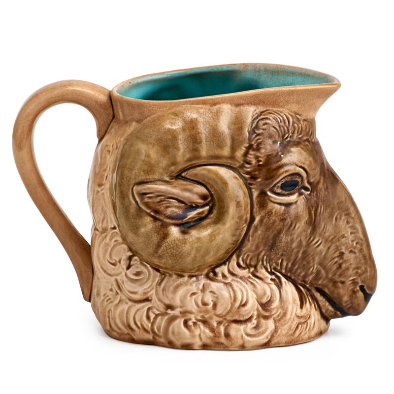 Appraisal: SARREGUEMINES POTTERY PITCHER Ram's head with turquoise glaze interior th