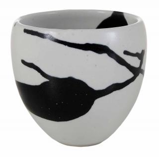 Appraisal: Christine British b porcelain with black and white glazes initials