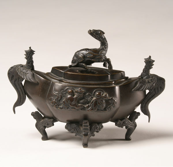 Appraisal: Bronze censor applied mythological beasts on lid and body additional