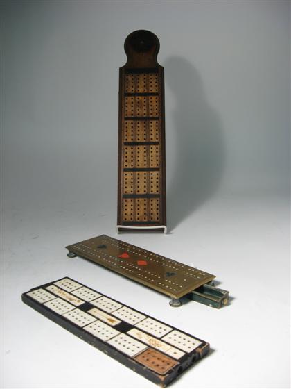 Appraisal: Ebony and ivory brass and walnut cribbage boards th century