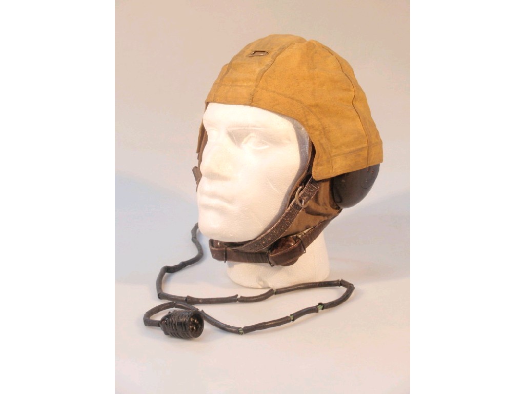 Appraisal: A WWII flying helmet with canvas cover