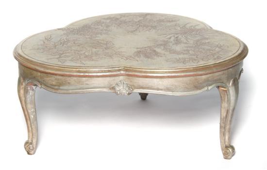 Appraisal: Kuehne Silvered Low Table the lobed top with incised foliate