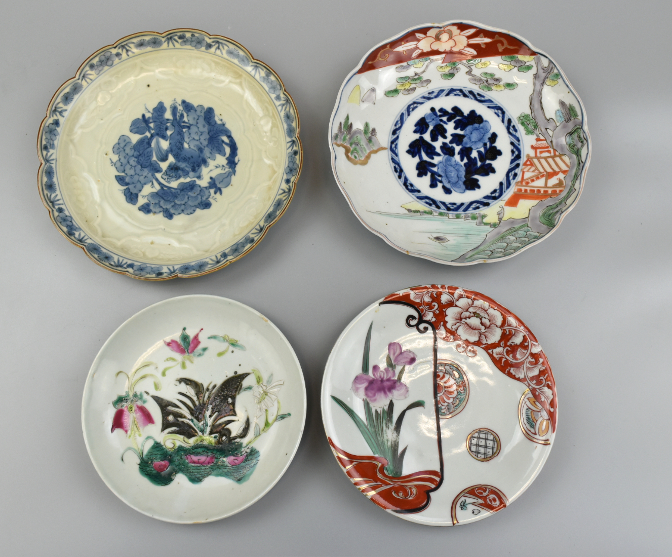 Appraisal: Four Chinese Japanese famille rose plates enameled with flower plants