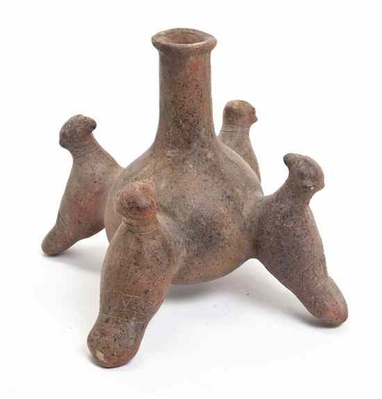 Appraisal: A Pre-Columbian Style Pottery Vase of bottle form raised on