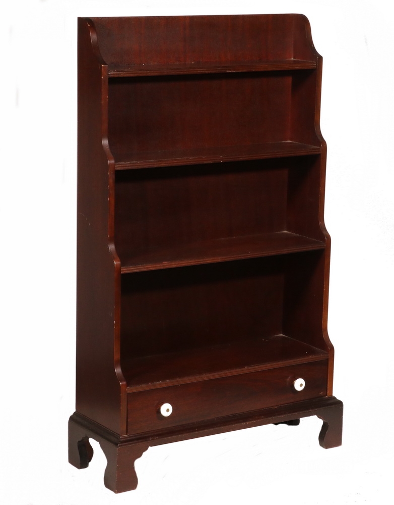 Appraisal: SMALL S MAHOGANY WATERFALL SHELF UNIT Freestanding Multi-Tier Bookcase having