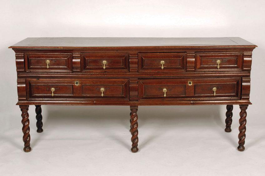 Appraisal: A CHARLES II OAK DRESSER BASE the rectangular top with