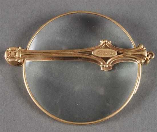 Appraisal: Art Nouveau style K yellow gold and glass magnifying lens