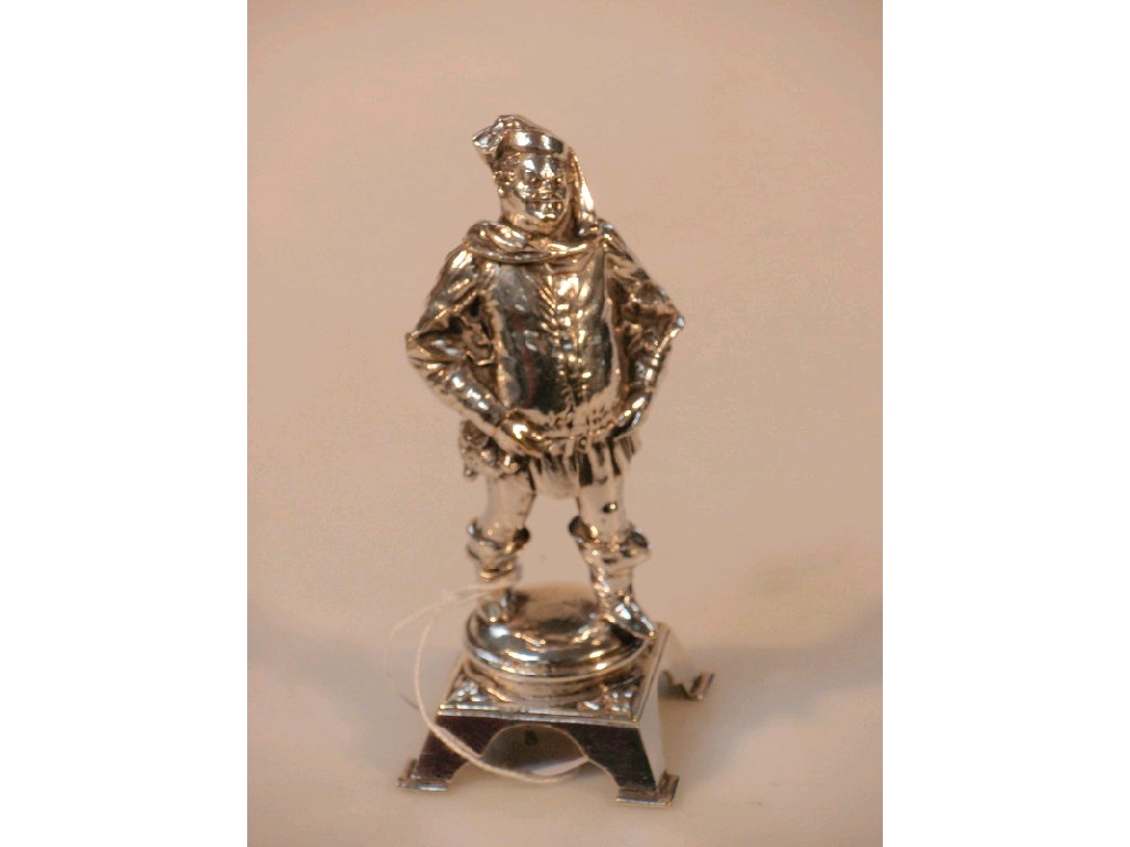 Appraisal: A cast silvered metal figure of Falstaff on circular socle